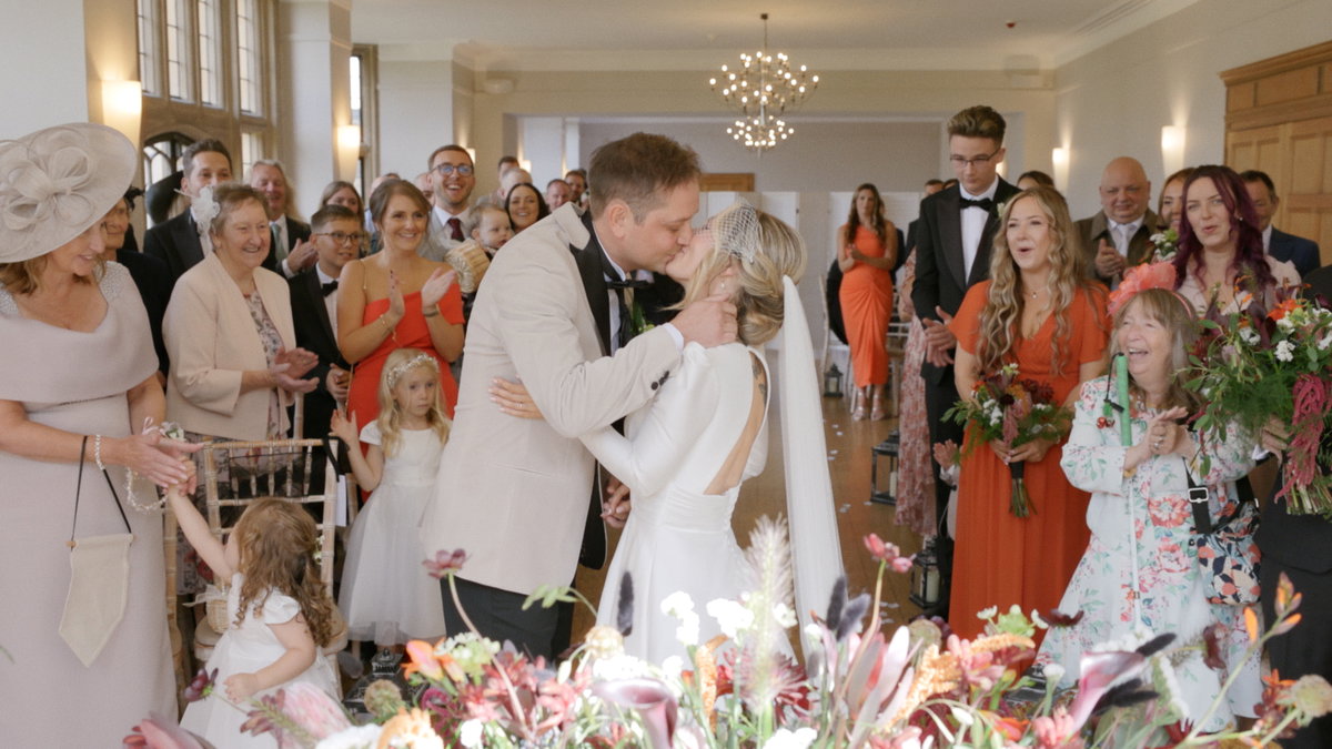 Gail and Jon celebrating their wedding at Coombe Lodge near Bristol